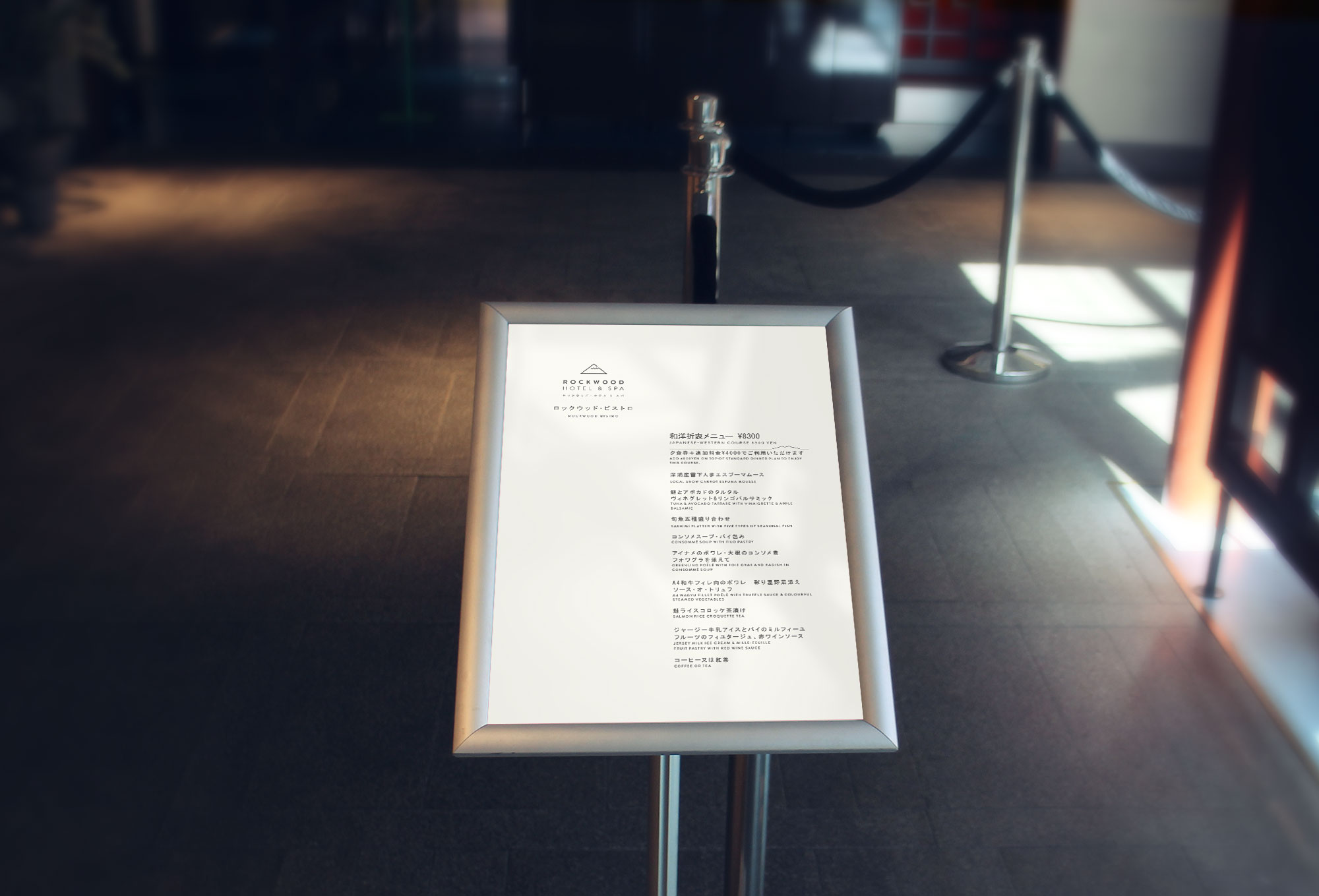 Two Morlinka scented wax tablets hanging from a wooden hanger against a soft fabric background, showcasing elegant and minimal branding.